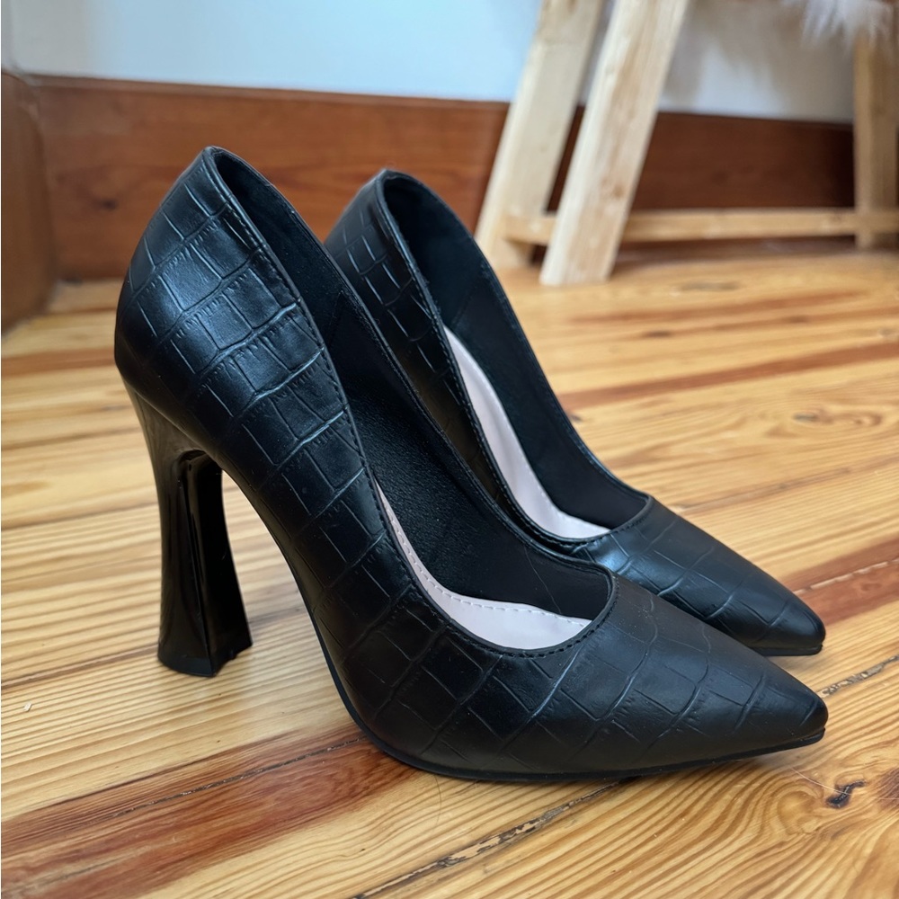 Brand new black heels, never worn